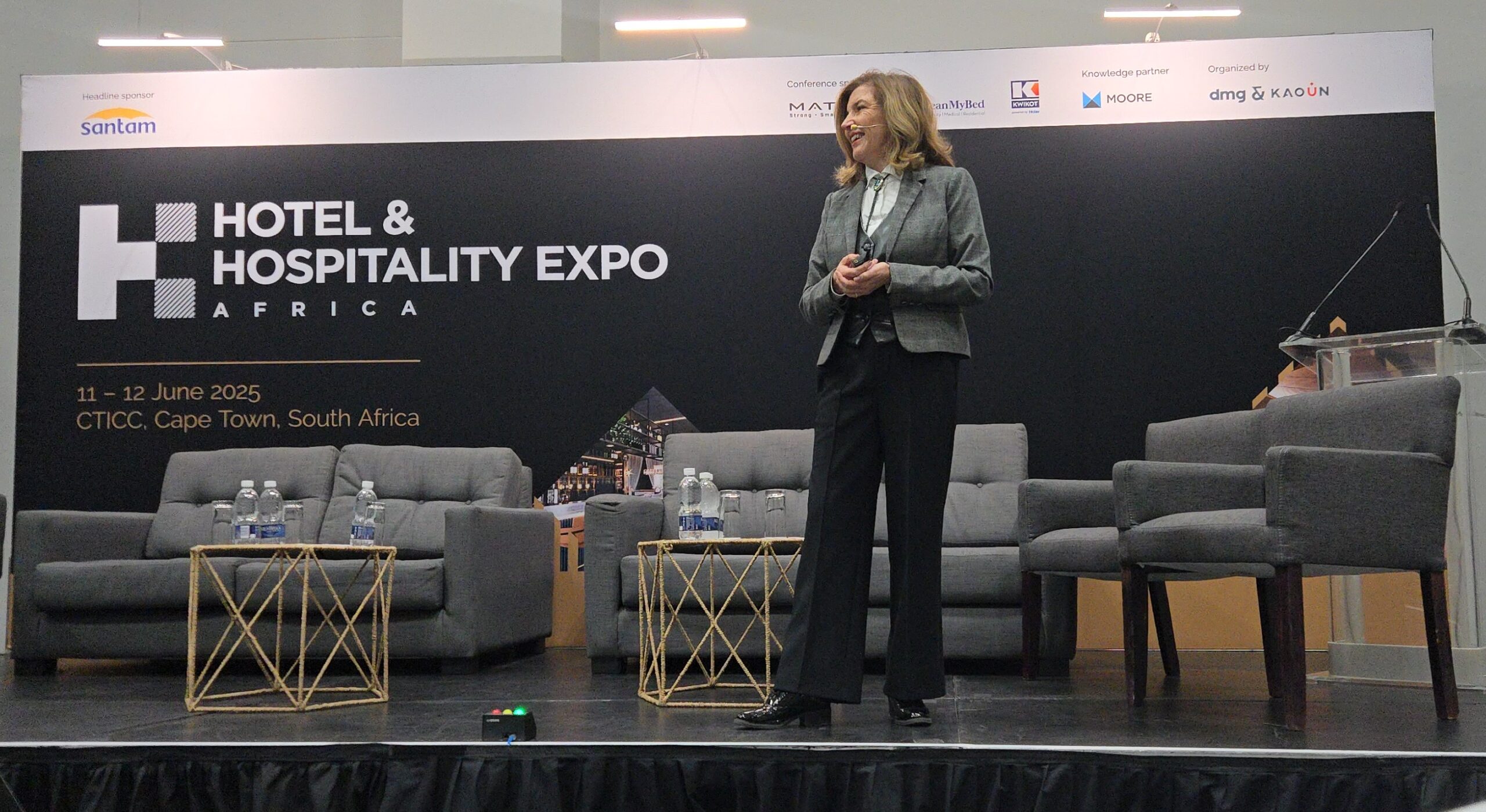 Theresa on stage talking to Hotel and Hospitality Expo